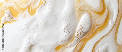 Swirls of honey and cream create a visually appealing texture.