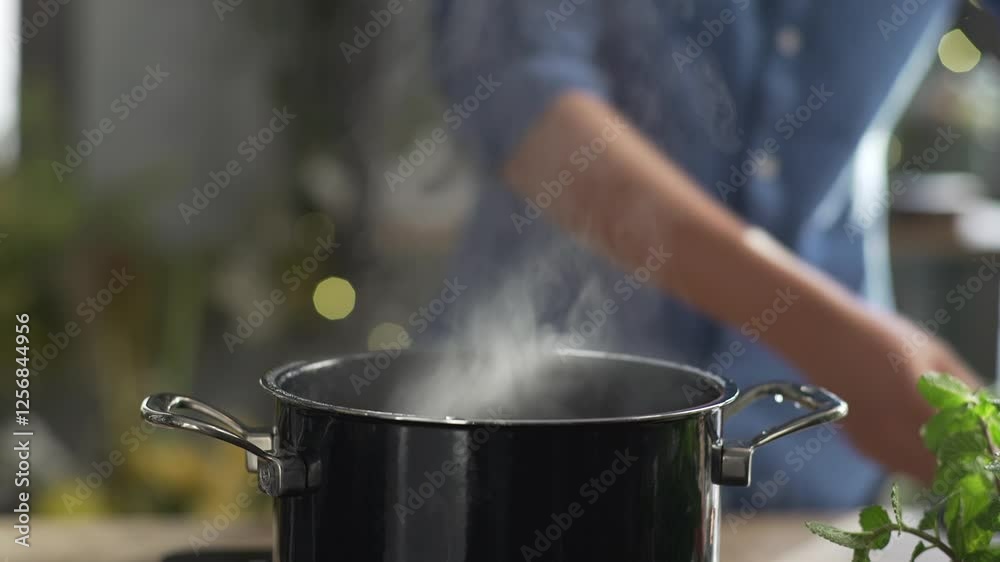 Fresh ingredients, including shrimp, mushrooms, and tomatoes, are added to a steaming pot for a flavorful homemade soup in a cozy kitchen setting. Fresh ingredients, including shrimp, mushrooms, and tomatoes, are added to a steaming pot for a flavorful homemade soup in a cozy kitchen setting.