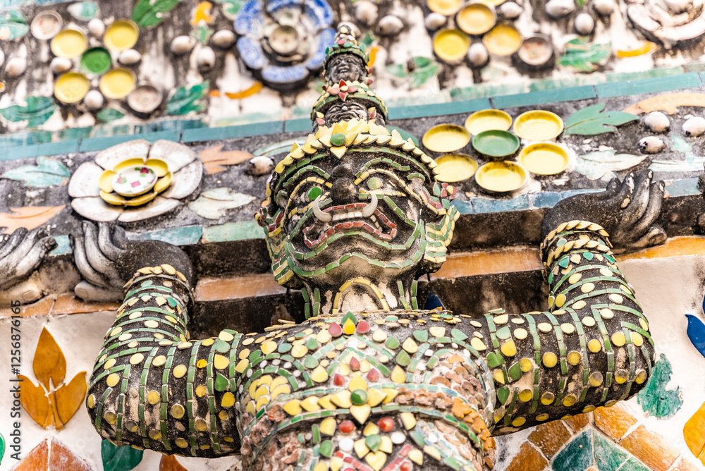 Fototapeta premium Wat Arun decor elements ornament close up. Best known of Thailand's landmarks in Bangkok
