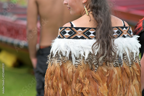 Maori adult man and woman wearing traditional clothing's on Waitangi Day