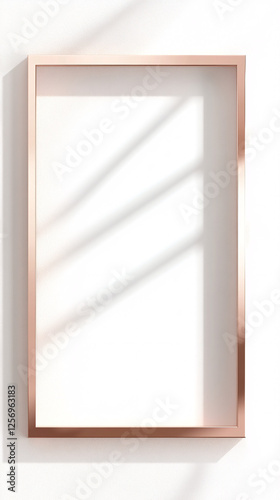 rose gold frame mockup with sunbeams on white wall