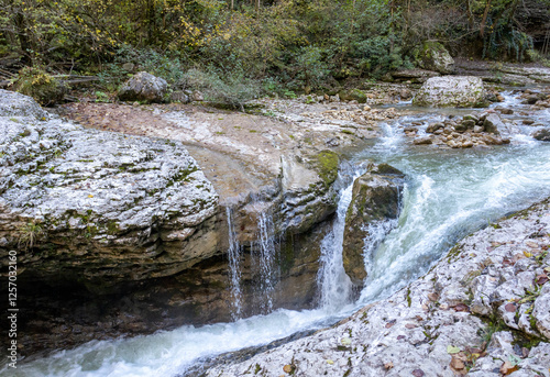 The canyon of the mountain river is a channel in a mountainous area with bizarre patterns and depressions