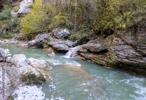 The canyon of the mountain river is a channel in a mountainous area with bizarre patterns and depressions