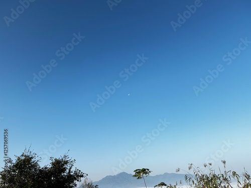 Photography A bright and clear blue sky with no clouds, creating a peaceful and refreshing a