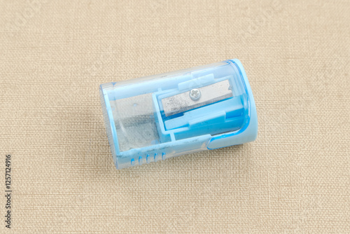 Top view of blue plastic pencil sharpener
 photo