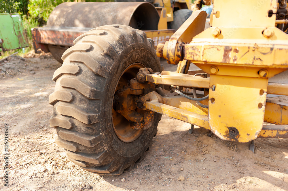 Industrial efficiency heavy machinery action at a roadwork construction zone Industrial efficiency heavy machinery action at a roadwork construction zone