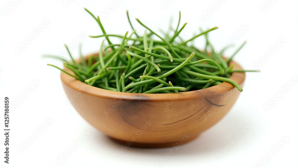 tarragon placed in a rustic wooden bowl, isolated on a pure white background with a precise clipping path tarragon placed in a rustic wooden bowl, isolated on a pure white background with a precise clipping path