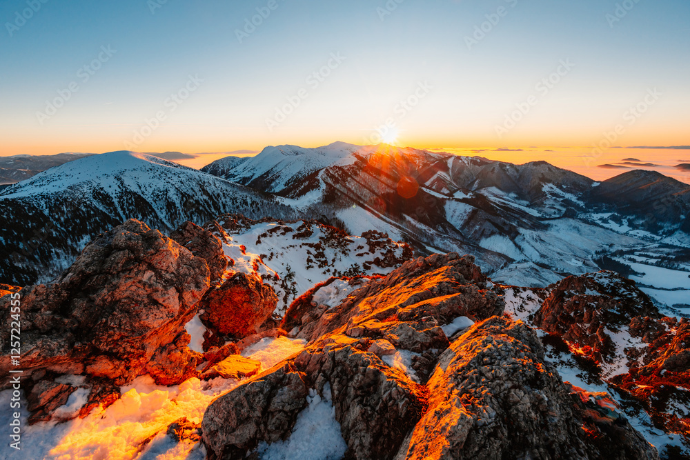 Naklejka premium Winter hiking to Velky Rozsutec in Mala Fatra National park is full of beautiful views. Sunset in Slovakia mountains. Slovakia landscape