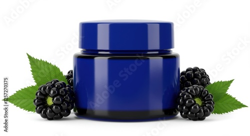 Luxurious skincare jar with blackberry and leaves on white background photo