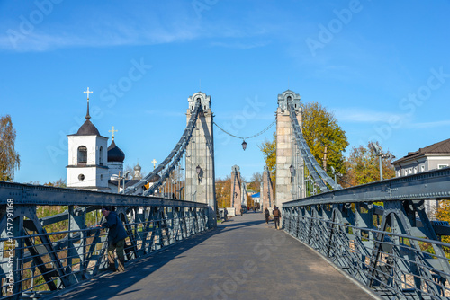 Old chain bridges in the urban landscape. Ostrov city, Pskov region