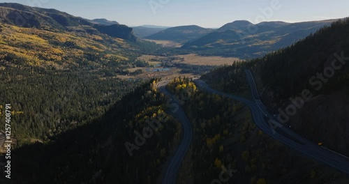 Wolf creek valley in pagosa springs, showcasing vibrant fall foliage, aerial view photo