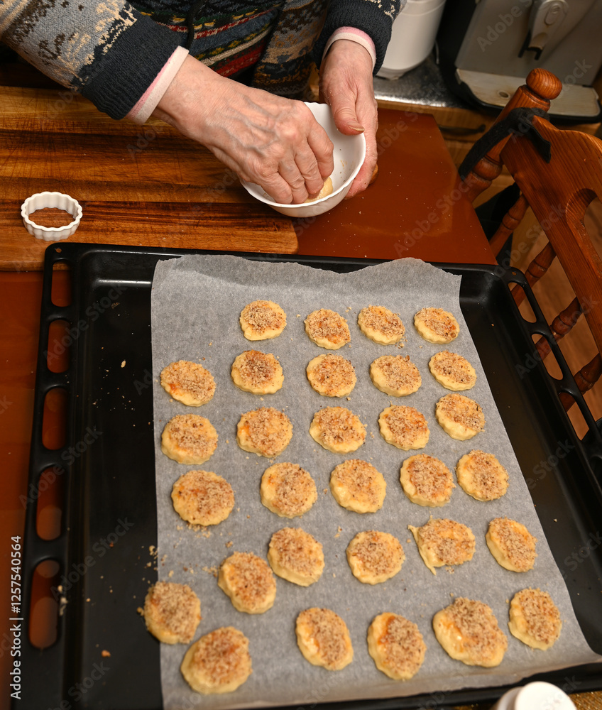 Baking sweet cookies with a crunchy topping in a warm kitchen during a cozy afternoon