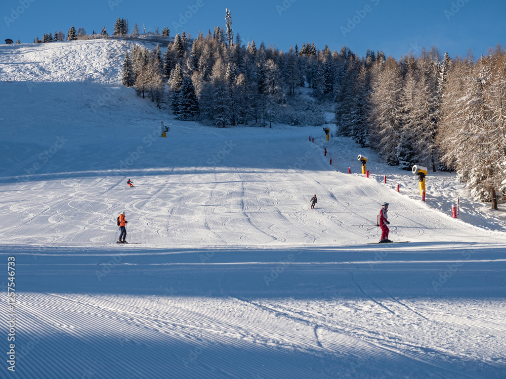 Skiing on the Dolomites Civetta resort On a beautiful sunny day. Italy