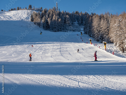 Obraz na płótnie Skiing on the Dolomites Civetta resort On a beautiful sunny day. Italy w salonie