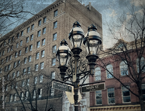 Antique iron streetlight with street names on the crossroads in Bethlehem, Pennsylvania, USA. Bethlehem is one of three cities, that are the urban population centers of the Lehigh Valley