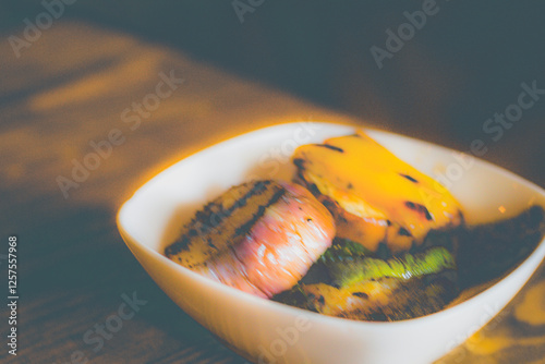 grilled eggplant, zuchini,bell peppers served in a whte bowl