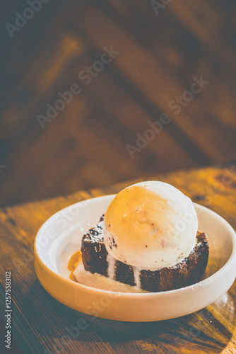 Homemade banana cake, salted caramel ice cream and toasted almond