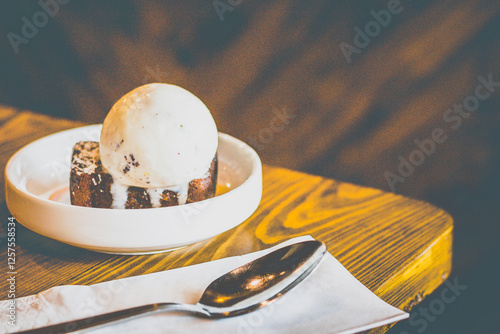 Homemade banana cake, salted caramel ice cream and toasted almond