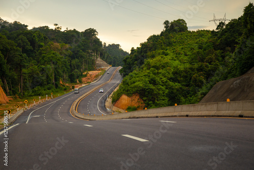 Road No. 4 Phetkasem Road from Phatthalung Province to Trang Province, passing through Khao Phap Pha, a mountain range and one of the most pristine forests in the South of Thailand photo