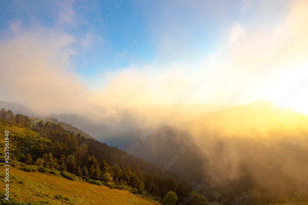 Misty mountains at sunset. Layered mountains landscape Misty mountains at sunset. Layered mountains landscape