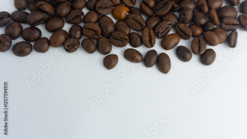  Roasted coffee beans are blackish brown, with a white background