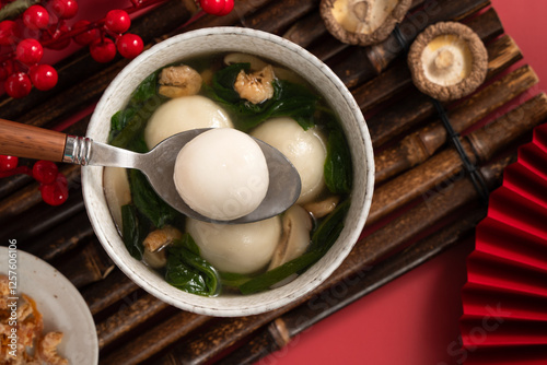 Big tangyuan, yuanxiao with savory soup for traditional lunar festival. photo