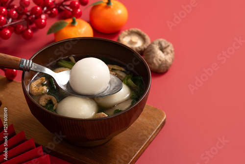 Big tangyuan, yuanxiao with savory soup for traditional lunar festival. photo