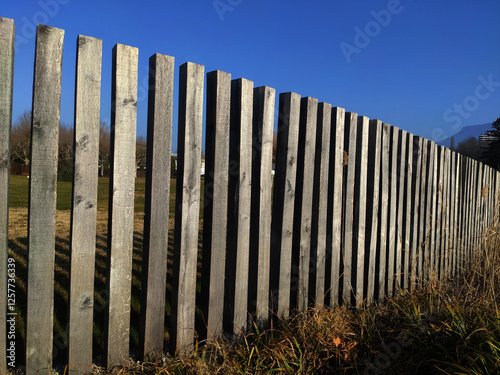 wooden fence on a beach