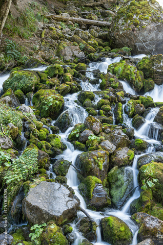 Beautiful waterfall in the mountains, Saut deth Pish, Pyrenees Mountains, Vall d'Aran, Catalonia, Spain