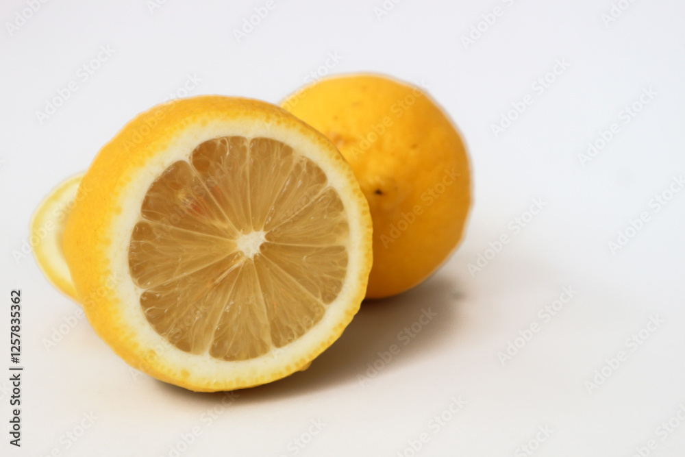 Fresh lemons with a sour taste and fresh aroma, Lemons (Citrus limon L.) Fresh lemons with a sour taste and fresh aroma, Lemons (Citrus limon L.)