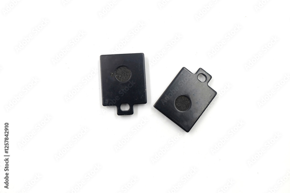 Couple of braking pads for motorbikes, isolated on white Couple of braking pads for motorbikes, isolated on white