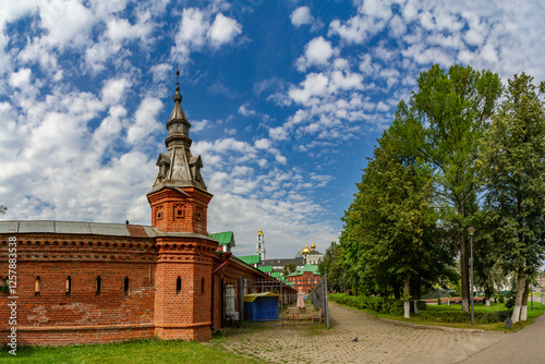 Red fortress wall with tower and workshops near Holy Trinity-Sergius Lavra. Sergiev Posad, Moscow region, Russia