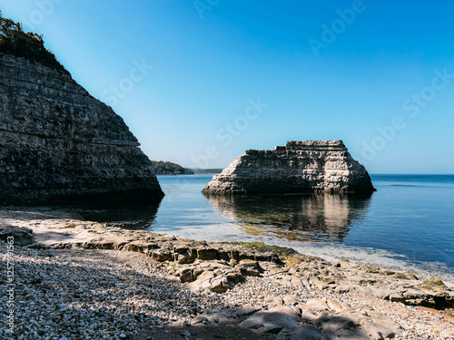 Fototapeta Naklejka Na Ścianę i Meble -  Sandstone rocks and pebble cove beach of Delikli Bay beach near Kerpe, Kocaeli Turkiye