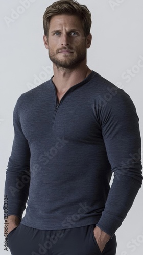 Elegant Lightweight wool mesh base layer shirt in charcoal gray displayed on a minimalist white background highlighting its breathable and moisture wicking texture outdoor wear  photo