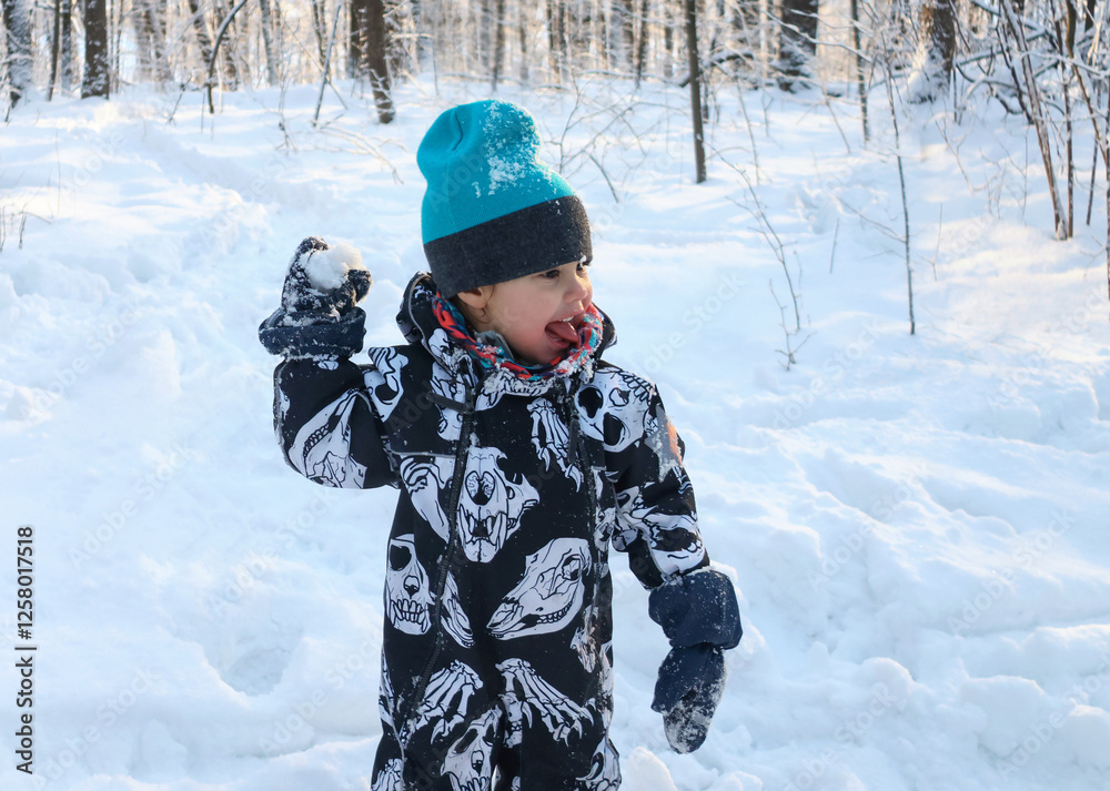 little boy in winter park