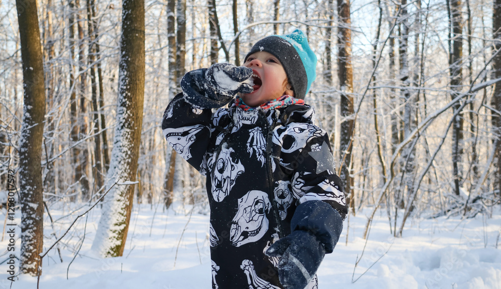 little boy in winter park