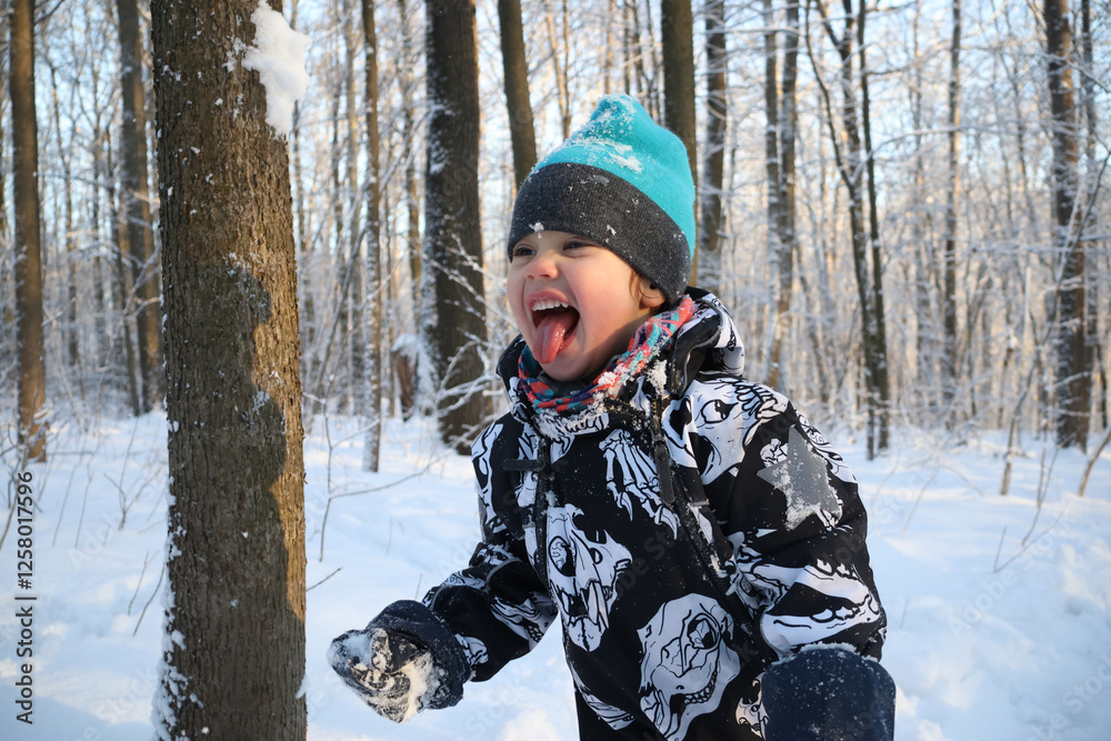 little boy in winter park