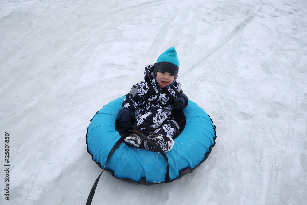 little boy in winter park