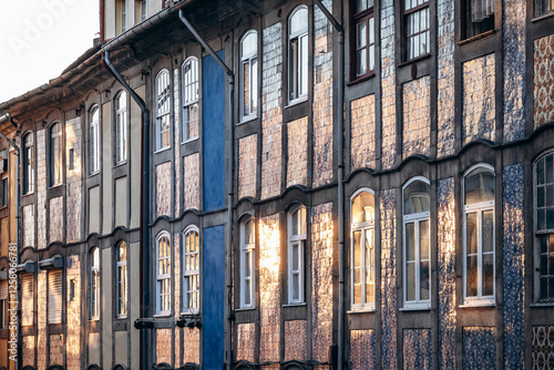 Close-up of a facade in Porto covered with traditional ceramic tiles (azulejos)