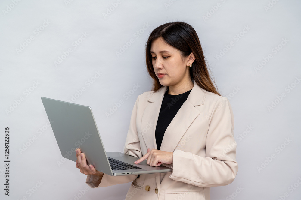 Focused Businesswoman Working Remotely on Technology Focused Businesswoman Working Remotely on Technology