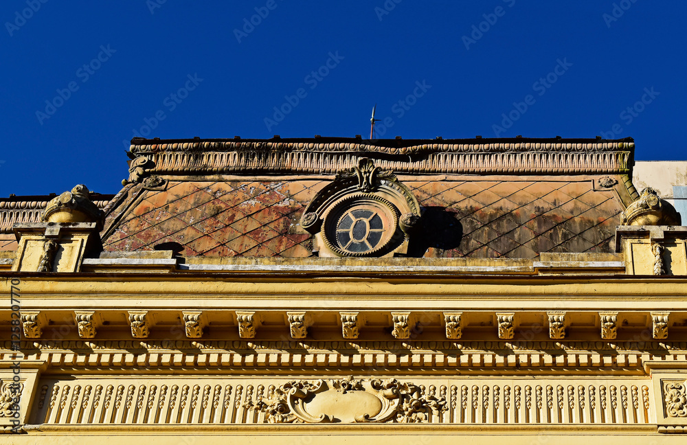 Yellow building facade (detail) in downtown Petropolis, Rio de Janeiro, Brazil