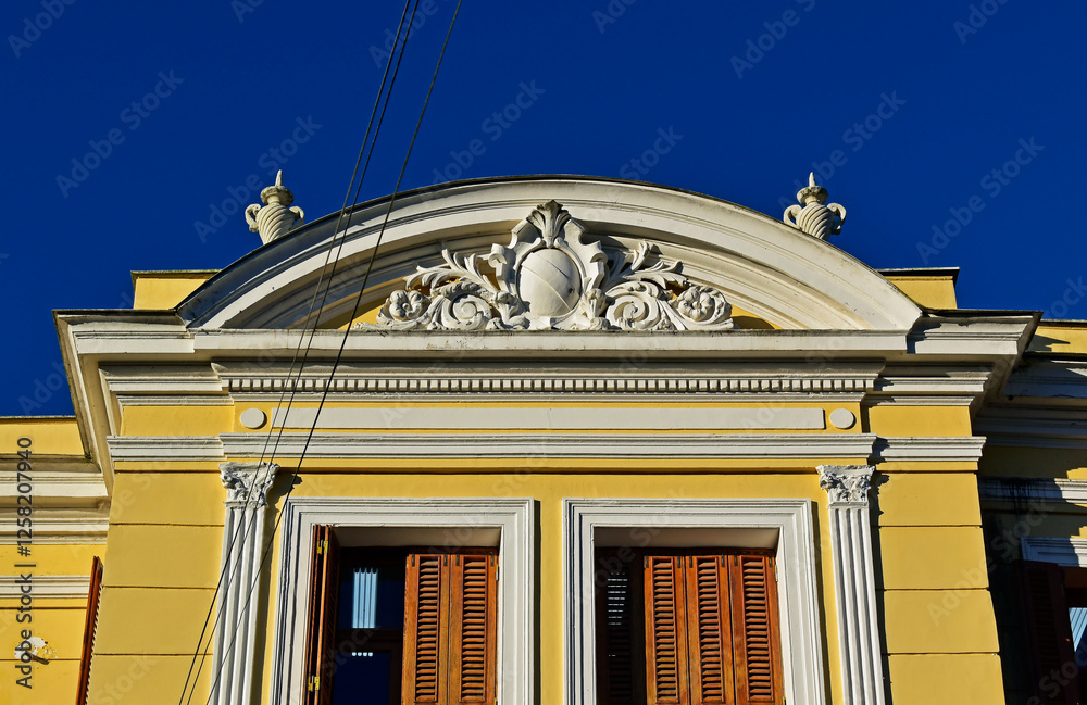 Yellow house facade (detail) in downtown Petropolis, Rio de Janeiro, Brazil