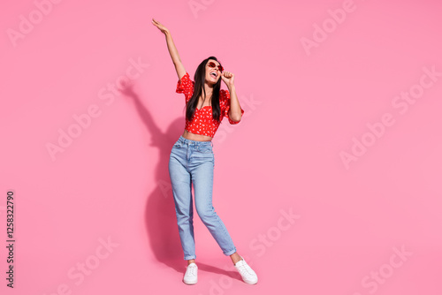 Full body portrait of nice young lady dancing wear top isolated on pink color background