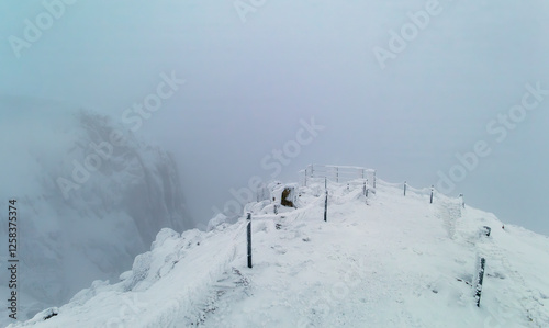  snowy landscape with rocks in Snezne Kotly on the Czech-Polish border photo