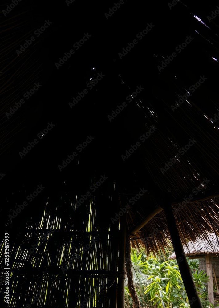 View from the southern side of a traditional thatched roof in a rural village that thatched roof can be sunproof and rainproof and good ventilation the history of hay or old haystraw roof abstract bam