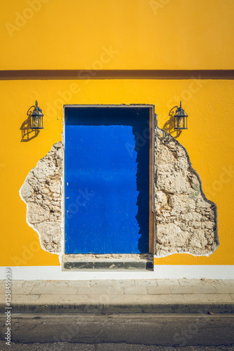 Bright Blue Door in a bright yellow wall
