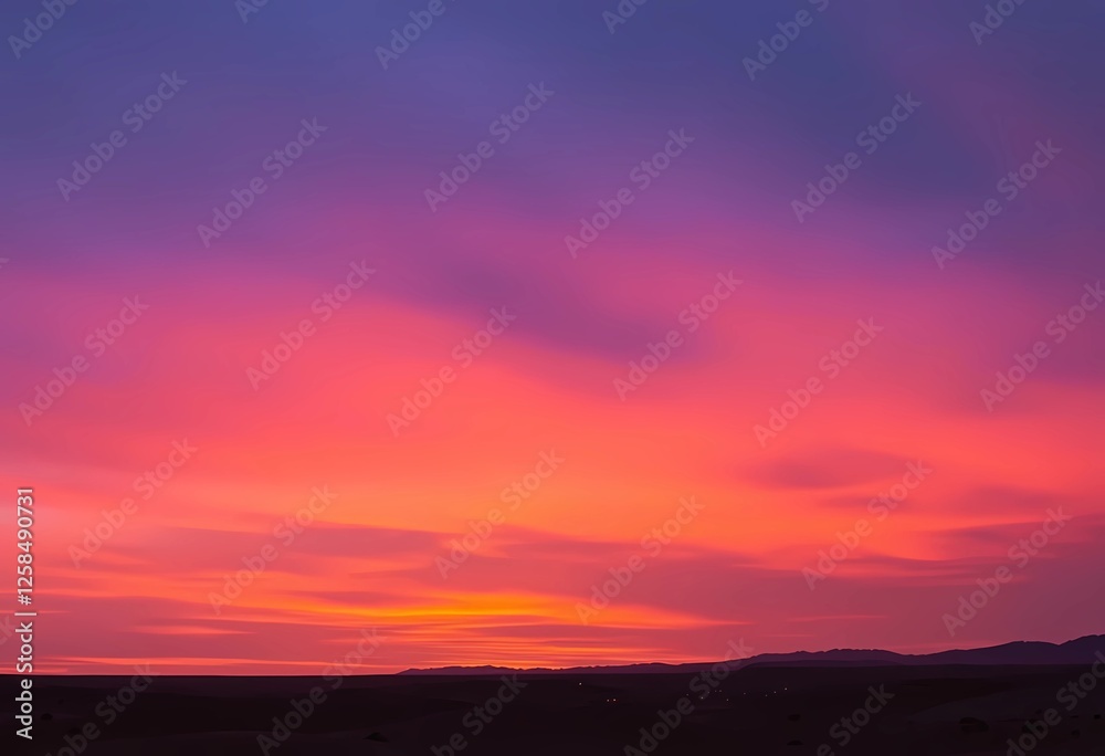 Fototapeta premium Vibrant Sunset Hues Over a Serene Landscape