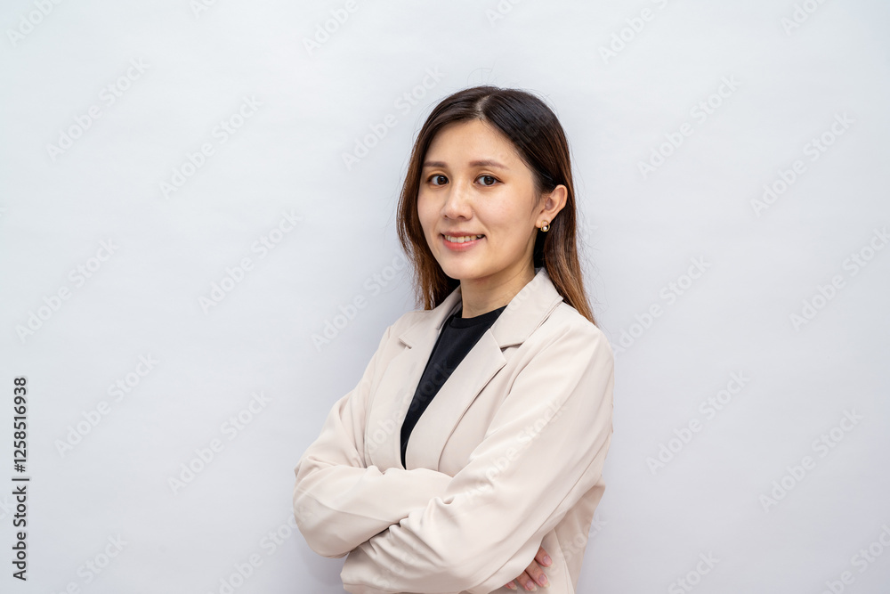Young asian woman, professional entrepreneur standing in office clothing, looking confident, white background Young asian woman, professional entrepreneur standing in office clothing, looking confident, white background