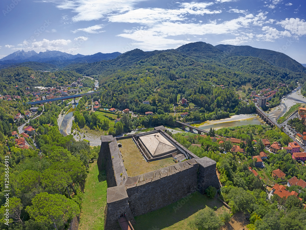 Old Aulla Brunella fortress landmark in Tuscany, Italy. The Brunella Fortress dominates the strategic Aulla village from on high, located where the river Magra and Aulella meet.