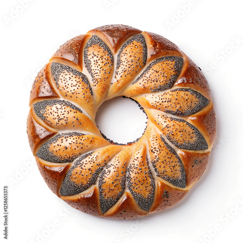 openwork kalach sprinkled with poppy seeds